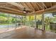 This beautiful covered porch offers an outdoor space to relax and enjoy the scenery at 961 Parkside Dr, Columbus, IN 47203