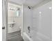 Bathroom featuring a sink, toilet, shower, and neutral-colored walls at 9829 Chambray Dr, Indianapolis, IN 46280