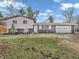 Charming two-story home featuring a combination of brick and siding, plus an attached two car garage at 9829 Chambray Dr, Indianapolis, IN 46280
