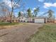Charming two-story home with a driveway and well-maintained front lawn at 9829 Chambray Dr, Indianapolis, IN 46280