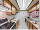 Functional kitchen featuring ample cabinet space and essential appliances for easy meal preparation at 9855 Haven Ct, Indianapolis, IN 46235