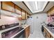 Well-lit kitchen featuring essential appliances and functional design for everyday cooking needs at 9855 Haven Ct, Indianapolis, IN 46235