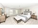 Serene main bedroom with a large bed, stylish decor, and plenty of natural light at 10362 Delphi Ct, Fishers, IN 46038