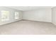 Bright, carpeted room featuring natural light at 10362 Delphi Ct, Fishers, IN 46038