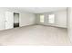 Bedroom with plush carpet and plenty of natural light at 10362 Delphi Ct, Fishers, IN 46038