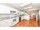 Well-equipped kitchen with granite countertops, tile backsplash, and stainless appliances at 10362 Delphi Ct, Fishers, IN 46038