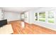 Inviting living room with natural light and hardwood floors at 10362 Delphi Ct, Fishers, IN 46038
