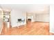 Open living room with beautiful hardwood floors and recessed lighting at 10362 Delphi Ct, Fishers, IN 46038