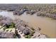 Picturesque aerial view of condo complex with private boat docks and stunning lake views at 11264 Fonthill Dr, Indianapolis, IN 46236