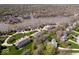 Expansive aerial view of lakeside property with private docks and lush green spaces at 11264 Fonthill Dr, Indianapolis, IN 46236