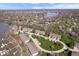 Beautiful aerial showcasing manicured grounds, mature trees, and lovely condo community at 11264 Fonthill Dr, Indianapolis, IN 46236