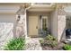 Charming front porch features a cozy seating area, decorative lighting, and well maintained landscaping at 11264 Fonthill Dr, Indianapolis, IN 46236