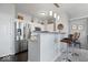 Modern kitchen featuring stainless steel appliances, granite countertops, and bar seating at 11264 Fonthill Dr, Indianapolis, IN 46236