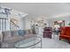 Inviting living room flowing into the kitchen area with stairs and great natural light at 11264 Fonthill Dr, Indianapolis, IN 46236