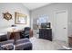 Sitting room with natural light, carpeted floors, and a wooden desk at 11264 Fonthill Dr, Indianapolis, IN 46236