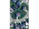 Aerial view of the home on a cul-de-sac with a beautifully landscaped yard and mature trees at 11786 Ledgestone Cir, Fishers, IN 46037