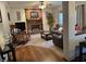 Inviting living room with a brick fireplace, plush seating, and cozy decor, ideal for gatherings at 11786 Ledgestone Cir, Fishers, IN 46037