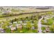 Neighborhood aerial showcasing green spaces and surrounding area at 1213 Fairview Dr, Greenfield, IN 46140