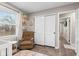 Bedroom with a recliner, closet, shelving and access to other rooms at 1213 Fairview Dr, Greenfield, IN 46140