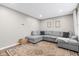 Comfortable living room showcasing a large sectional sofa, modern decor, and an inviting atmosphere at 1213 Fairview Dr, Greenfield, IN 46140