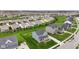 Aerial view of a residential neighborhood featuring well-manicured lawns and mature trees at 12902 Girvan Way, Fishers, IN 46037