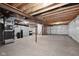 Spacious unfinished basement with concrete floor, exposed ceiling, and white-sealed walls at 12902 Girvan Way, Fishers, IN 46037
