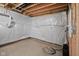 Unfinished basement with concrete floors, white-sealed walls, and a sump pump at 12902 Girvan Way, Fishers, IN 46037