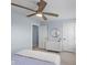 Bedroom with a ceiling fan, dresser, a bed with a patterned blanket, and neutral carpet at 12902 Girvan Way, Fishers, IN 46037