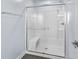 Bathroom featuring glass shower with a built in bench and chrome shower head at 12902 Girvan Way, Fishers, IN 46037