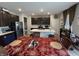 Open kitchen with stainless appliances, a large island, and ample cabinet space at 1303 Eton Way, Avon, IN 46123