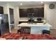 Bright kitchen with an island featuring a white countertop and stainless steel appliances at 1303 Eton Way, Avon, IN 46123