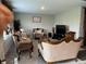 Elegant living room featuring classic furniture and ample space for relaxation and entertainment at 1303 Eton Way, Avon, IN 46123
