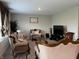 Elegant living room featuring classic furniture and ample space for relaxation and entertainment at 1303 Eton Way, Avon, IN 46123