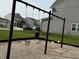 Community playground with swings and a grassy area, perfect for outdoor fun at 1303 Eton Way, Avon, IN 46123
