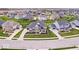 Stunning aerial view of a blue and gray home surrounded by meticulously landscaped lawns at 1352 Trifecta Way, Westfield, IN 46074