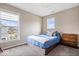 Cozy bedroom with natural light, neutral walls, and carpeted floors at 1352 Trifecta Way, Westfield, IN 46074