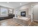 Luxurious main bathroom with a freestanding tub and cozy fireplace at 1352 Trifecta Way, Westfield, IN 46074