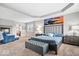 Comfortable main bedroom featuring a decorative fireplace and sitting area at 1352 Trifecta Way, Westfield, IN 46074