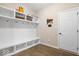 Well-organized mudroom with built-in storage and a convenient bench at 1352 Trifecta Way, Westfield, IN 46074