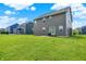 Large, well-maintained backyard with ample green space and a patio, ideal for outdoor activities and gatherings at 13567 Moorcroft Dr, Fishers, IN 46037