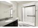 Bathroom featuring a granite vanity and a glass shower at 13567 Moorcroft Dr, Fishers, IN 46037
