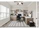 Beautiful office space complete with custom cabinets, a ceiling fan and natural light at 13567 Moorcroft Dr, Fishers, IN 46037