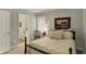 Inviting bedroom with neutral tones and an ensuite bathroom at 13587 Kensington Pl, Carmel, IN 46032
