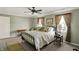 Inviting bedroom with large windows and detailed ceiling molding at 13587 Kensington Pl, Carmel, IN 46032