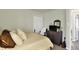 Bedroom features neutral colors, a dresser, and access to an additional room at 13587 Kensington Pl, Carmel, IN 46032