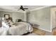 Comfortable bedroom with calm neutral paint and rug accents at 13587 Kensington Pl, Carmel, IN 46032