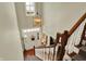 Bright foyer with hardwood floors and a view of the front door at 13587 Kensington Pl, Carmel, IN 46032