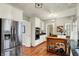 Spacious kitchen with stainless steel refrigerator and ample cabinet space at 13587 Kensington Pl, Carmel, IN 46032