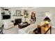 Spacious living room with fireplace, built-in shelves, and an open layout, great for entertaining guests at 13587 Kensington Pl, Carmel, IN 46032