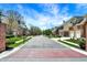 Quiet street view showcasing well-maintained homes, mature trees, and sidewalks in a friendly neighborhood at 13587 Kensington Pl, Carmel, IN 46032